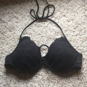 Vs halter lace top with conch string tie.